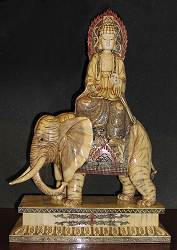 Carved and scrimshaw engraved elephant bone Kwanyin riding on Elephant with ivory detail (24 in. tall)- 19th century