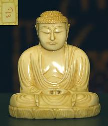 small Japanese ivory Buddha with wonderful golden patina (2 in. tall)